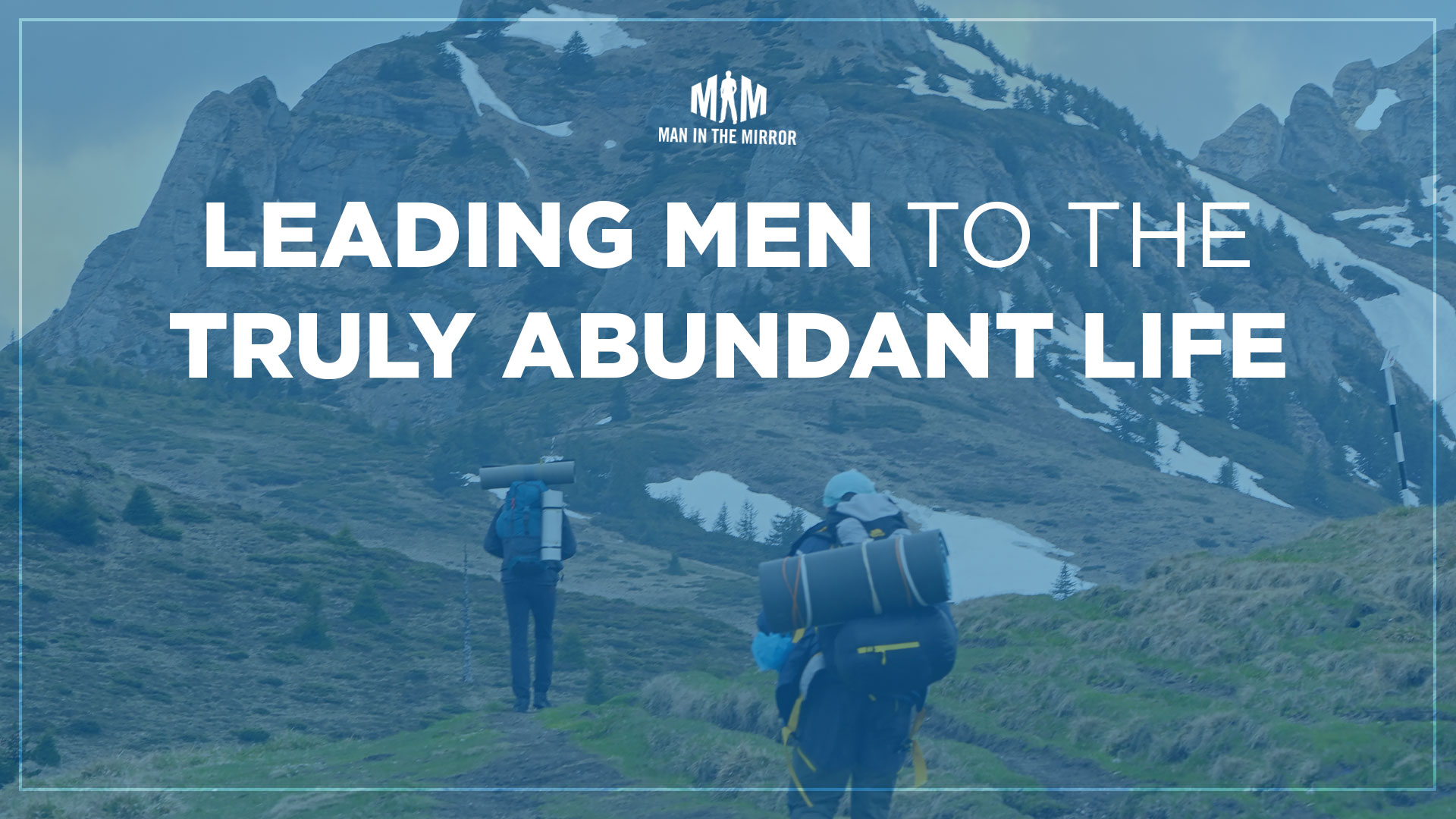Text: Leading Men to the Truly Abundant Life, Image: two men hiking up a mountain